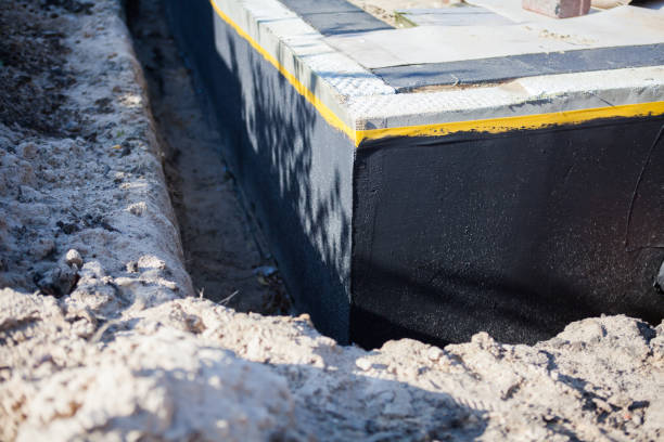 Professional Basement Waterproofing technician working in Hemlock, MI
